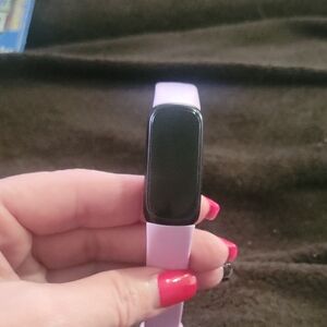 Purple Smartwatch with Sleek Design and Silicone Strap